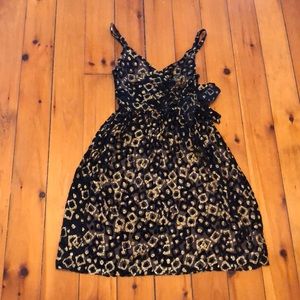 Milly of NY black and gold faux wrap dress